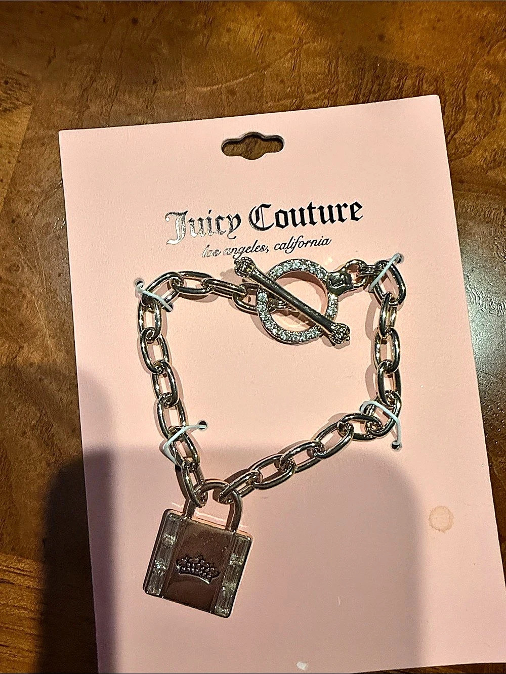 Juicy Couture Gold Tone Lock Charm Bracelet with Toggle Clasp NWT